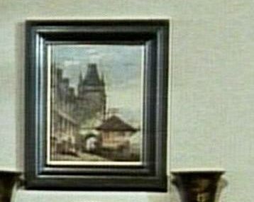 Hercule Poirot and Prague (picture on the wall)